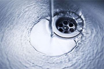 Water running into a sink.
